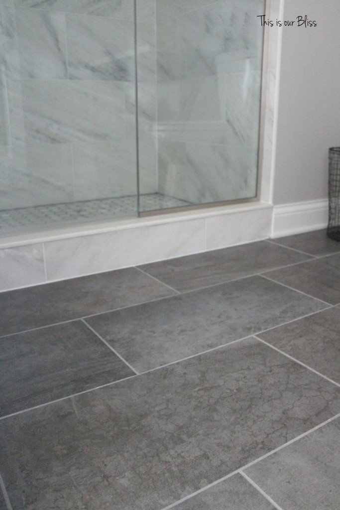 TIOB basement project - basement bathroom - marble tile & gray tile floor - This is our Bliss