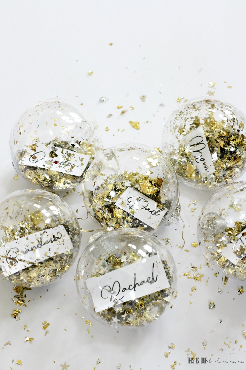 DIY Dollar Store Ornament Place Card - Metallic confetti-filled ornaments on a bright, bold and festive Christmas Table!