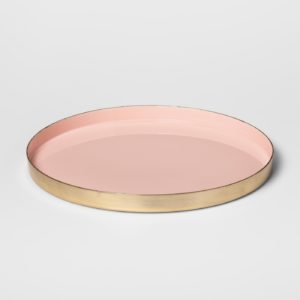 Round pink and brass tray