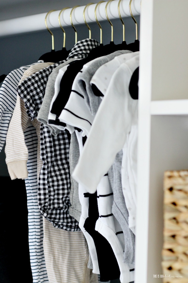 https://www.thisisourbliss.com/wp-content/uploads/2018/05/Sophisticated-Neutral-Nursery-Reveal-DIY-Nursery-closet-with-gender-neutral-baby-clothes-on-velvet-hangers-This-is-our-Bliss.jpg