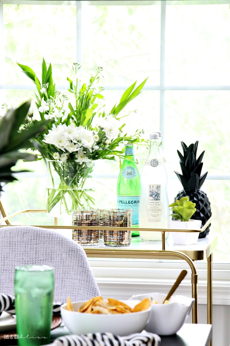 Tropical Summer Table with Pineapples, Palm Leaves and Leopard Print | Stylish Summer Entertaining || This is our Bliss