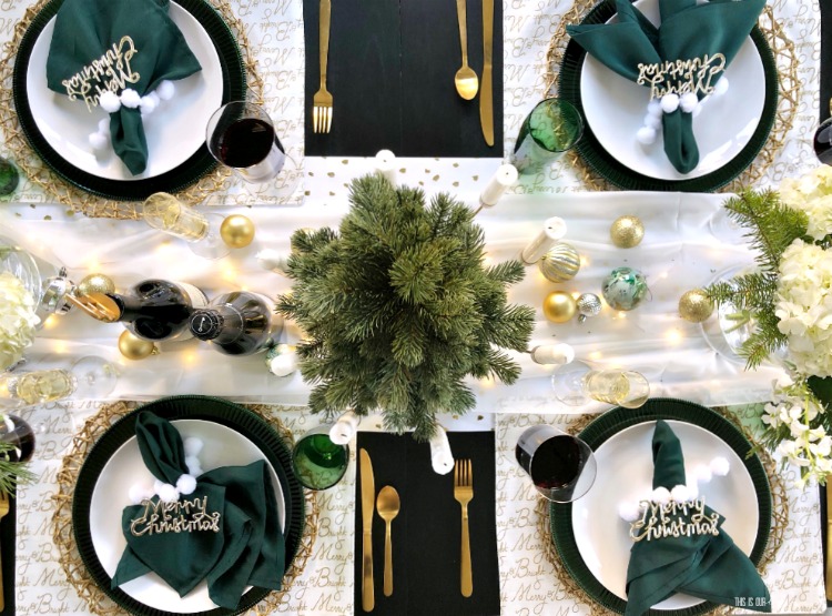 Christmas Tablescape with twinkling lights and green white and gold decor - This is our Bliss