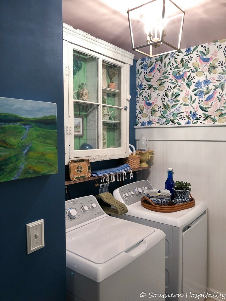 small-laundry-room-renovation-with-wallpaper-and vintage touches