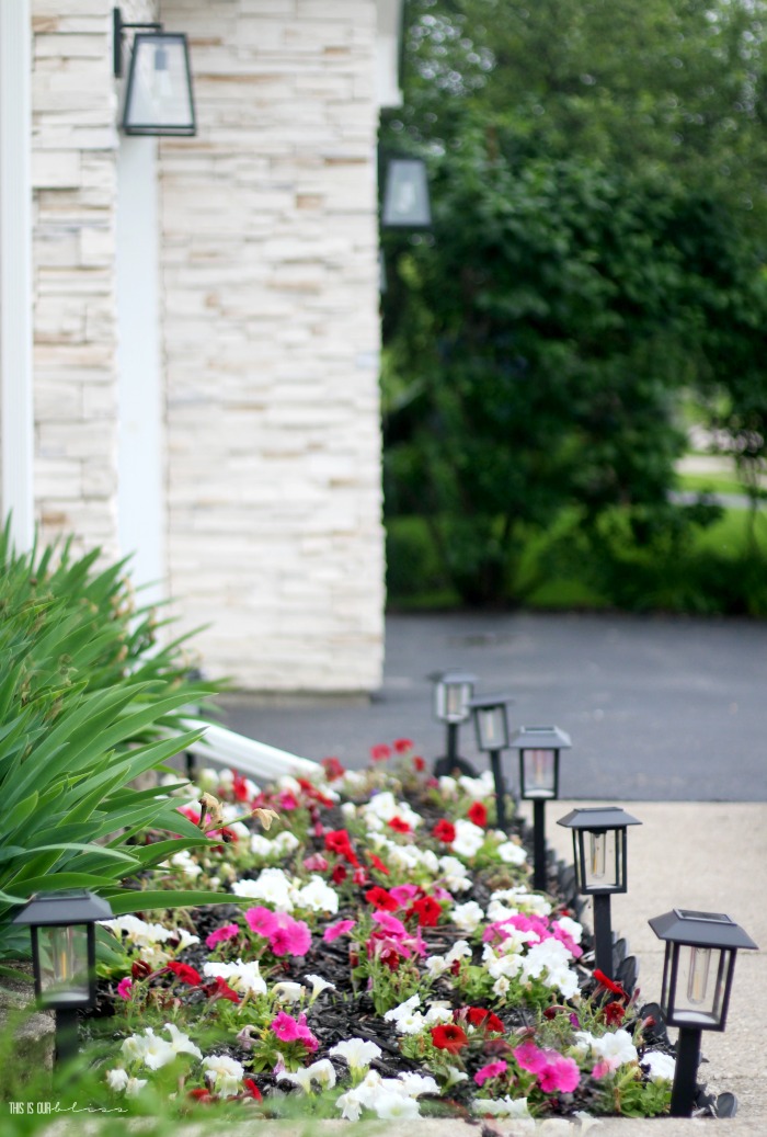 outdoor flower beds with Impatiens - Front porch decorating ideas for small porch - This is our Bliss