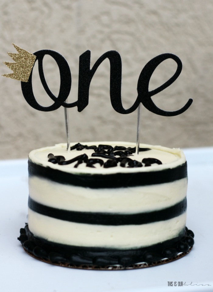 Mr. ONEderful first birthday party with cake topper on black and white smash cake - This is our Bliss