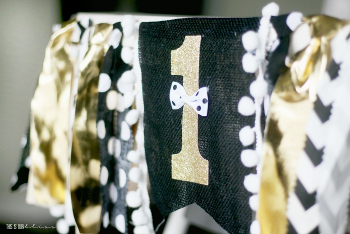 black white and gold first birthday boy high chair banner with ribbons - This is our Bliss