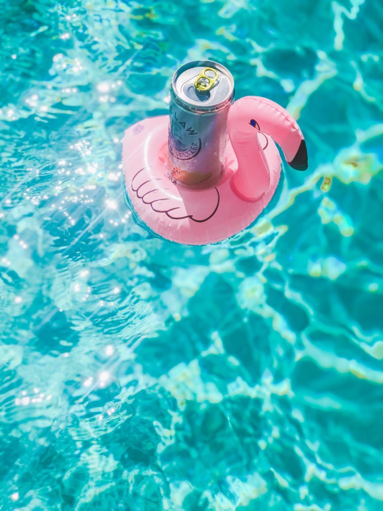 white claw on vacay with flamingo pool floatie - This is our Bliss