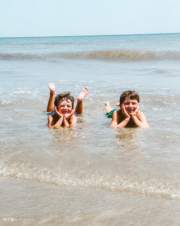 big boys in the ocean at the beach - Hilton Head Vacation Recap - This is our Bliss