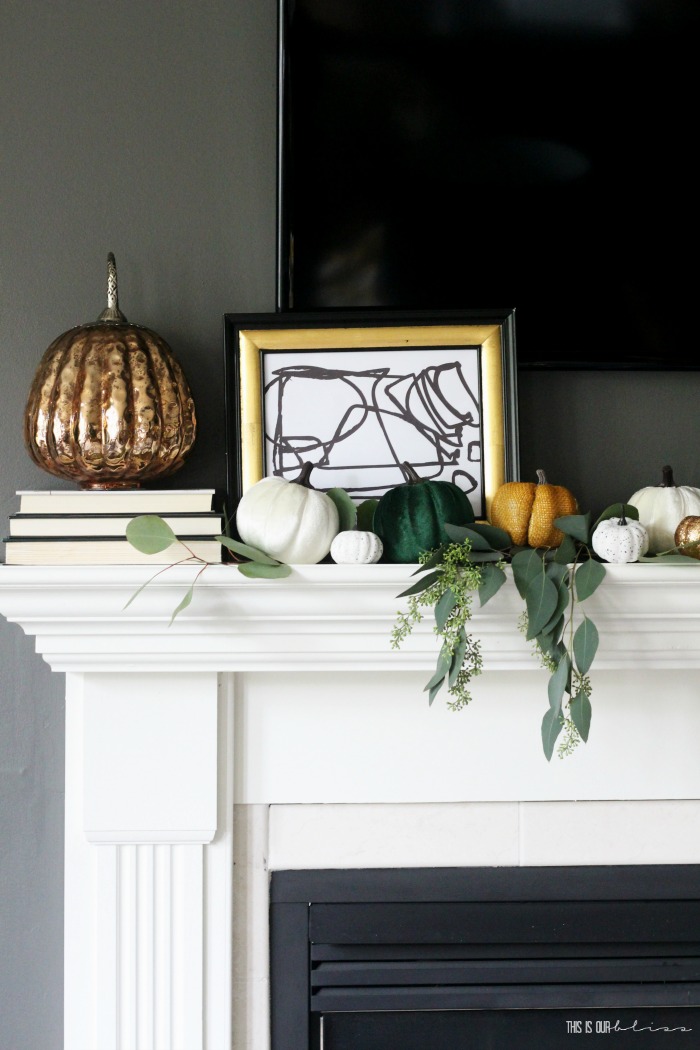 Fall mantel with pumpkins and eucalyptus stems - This is our Bliss - bold and modern mantel