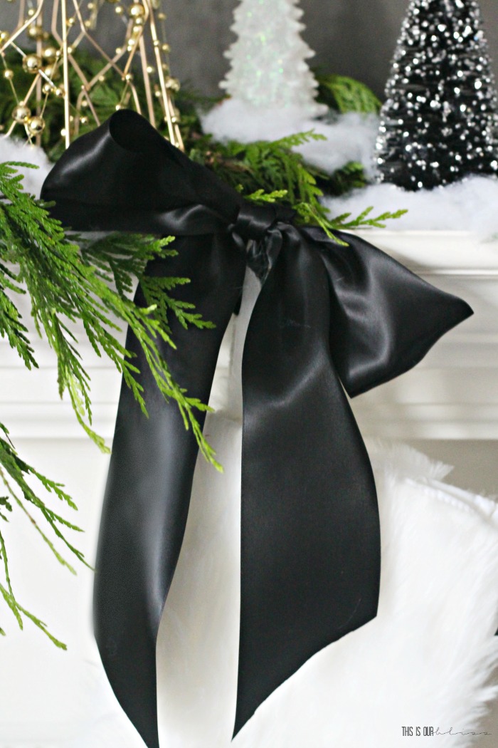 Classic satin ribbon - Black ribbon on stockings on Christmas mantel - simple and elegant Christmas mantel - This is our Bliss