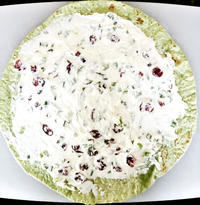Easy Christmas Pinwheel for easy holiday appetizer with spinach tortilla cranberry feta and cream cheese - This is our Bliss