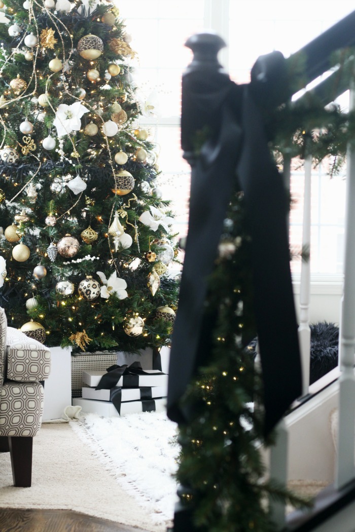 Simple and Elegant Christmas Decor - black satin ribbons on staircase with garland - This is our Bliss
