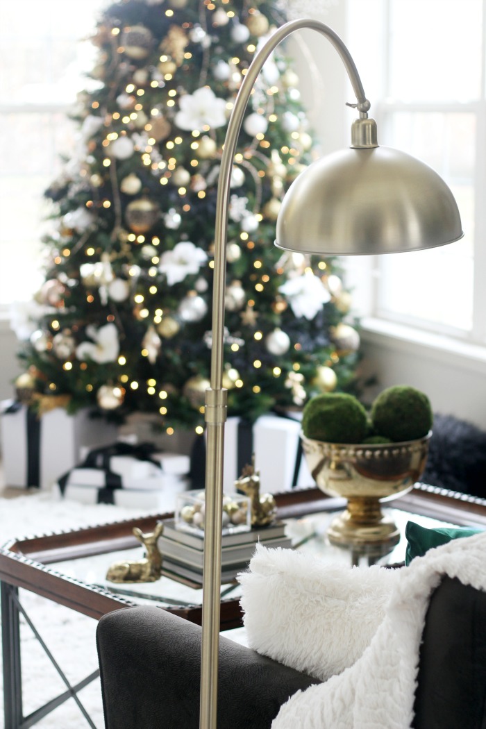 brass arc lamp in living room - simple and elegant Christmas decor - black w hite green and metallic - This is our Bliss