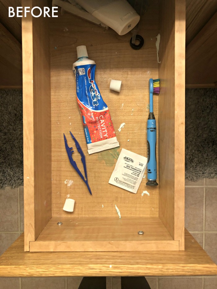 Boys' bathroom vanity drawers before - how to organize your bathroom vanity drawers - This is our Bliss