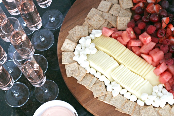 heart shaped charcuterie board with cheese crackers and fruit - This is our Bliss #charcuterieboard #galentinesdayideas #heartplatter #heartappetizerideas #charcuterieideas