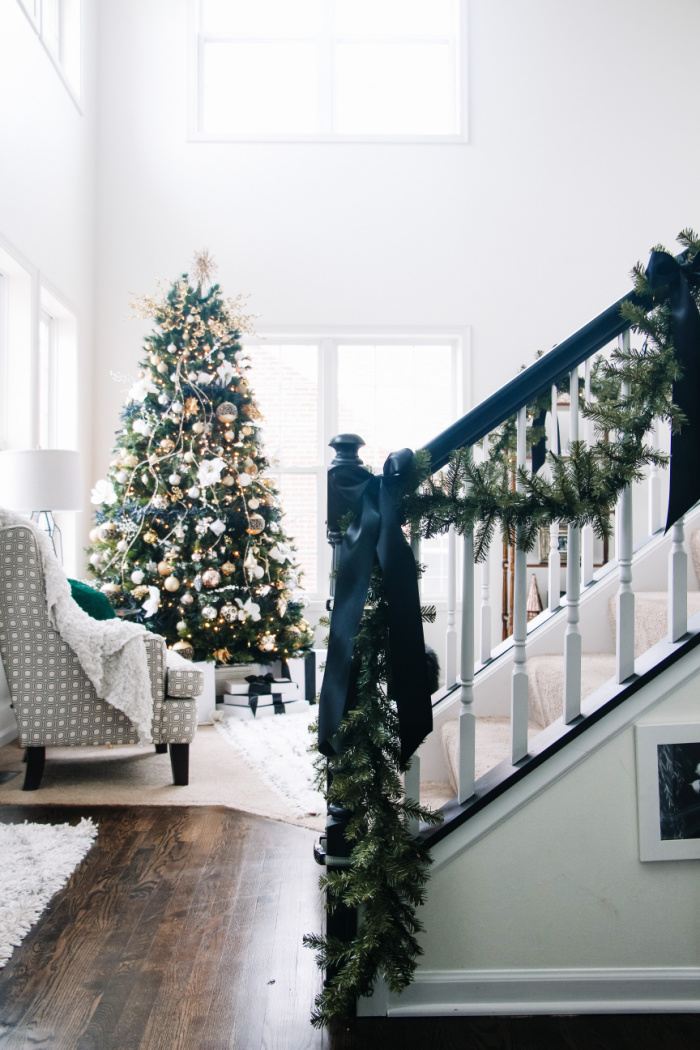 How to hang staircase garland - garland on the staircase for Christmas - This is our Bliss