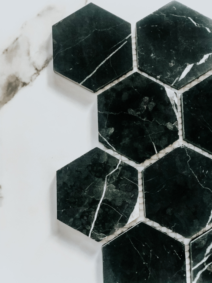 Tips for selecting coordinating bathroom tiles - black hexagon tile