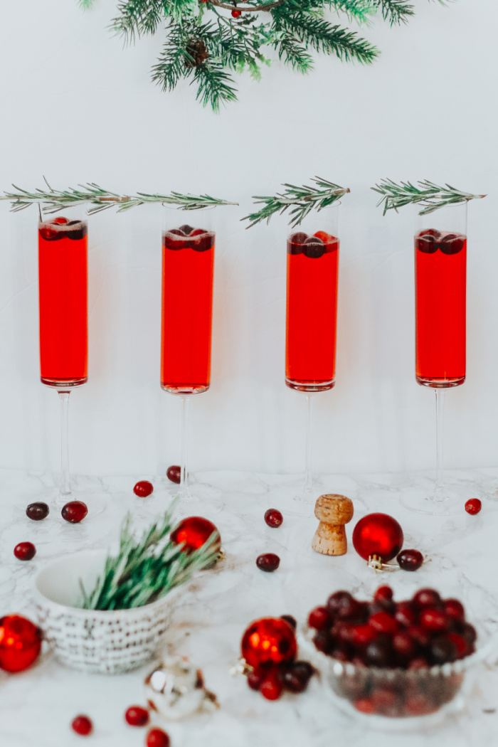 Festive Christmas drink ideas - Christmas morning Mimosas - cranberry mimosas - This is our Bliss #christmasmimosas #holidaydrinkrecipes
