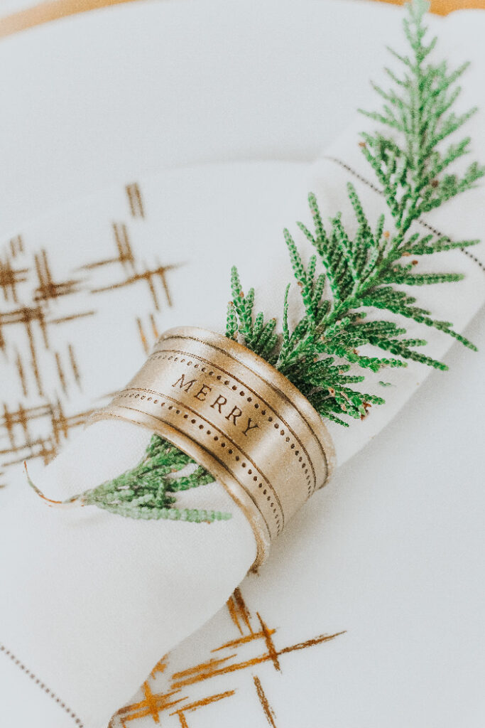 Fresh greens in the napkin ring for Christmas - This is our Bliss Dining Room tour