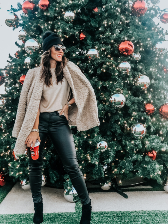 faux fur coat with black leather jeans - black coated jeggings with pom pom hat for the holidays - 12 days of Christmas style - This is our Bliss