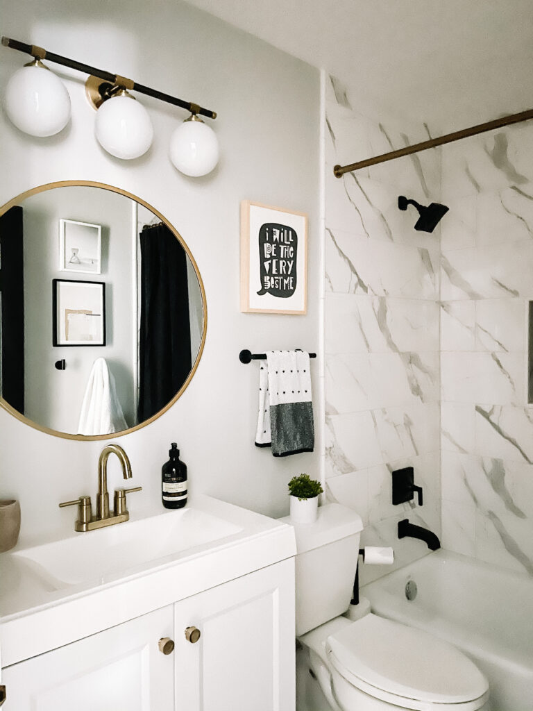 boys small bathroom reveal - black and white small bathroom - neutral bathroom design - modern lighting - black and gold bathroom fixtures- This is our Bliss