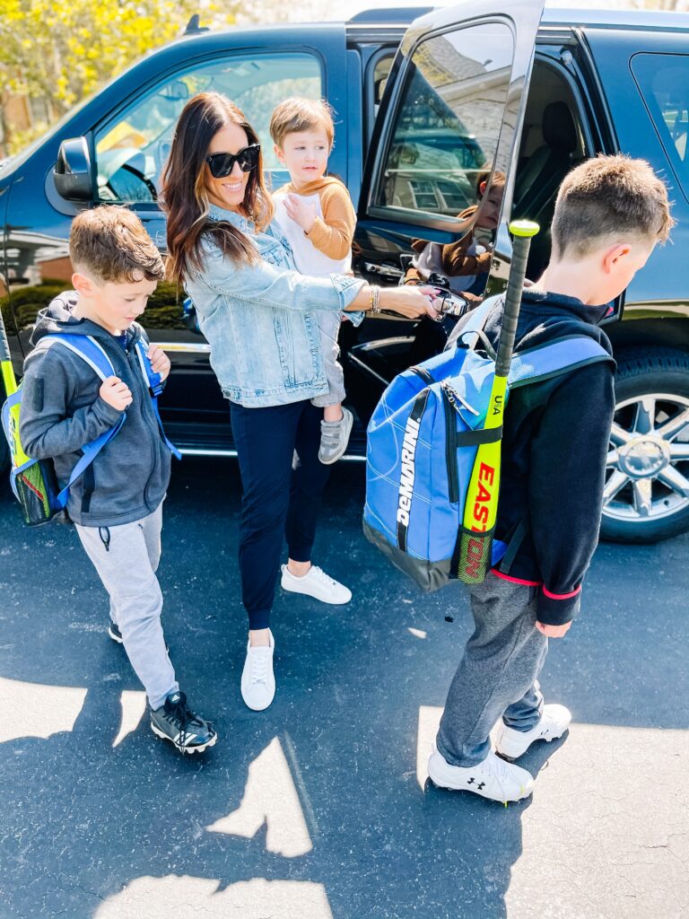 on the go weekdays and busy weekends - 4 Busy Mom hacks for curbing the snack-time chaos - loading the car with the boys -This is our Bliss