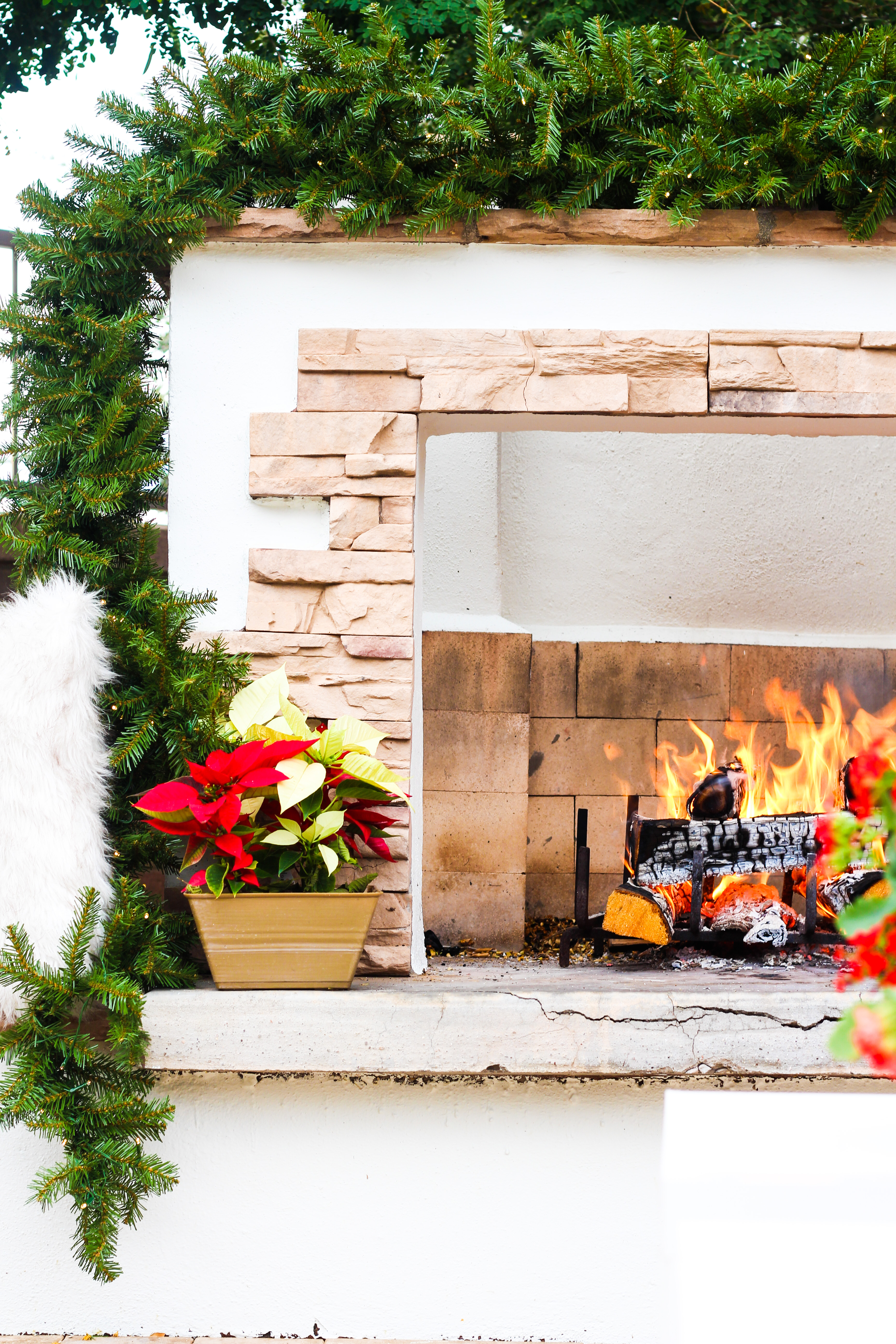 outdoor fireplace at Christmas - outdoor mantel - This is our Bliss #christmaspatio #ourdoorfireplace