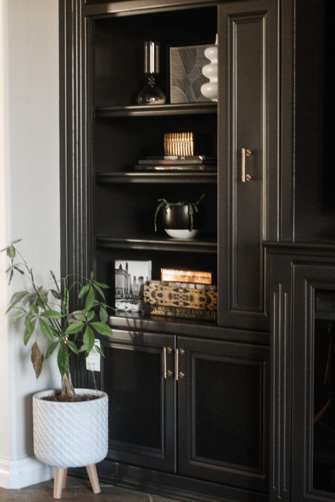 MInted art with styled bookcases - how I styled my built-ins - This is our Bliss #styledshelves #blackbookcase