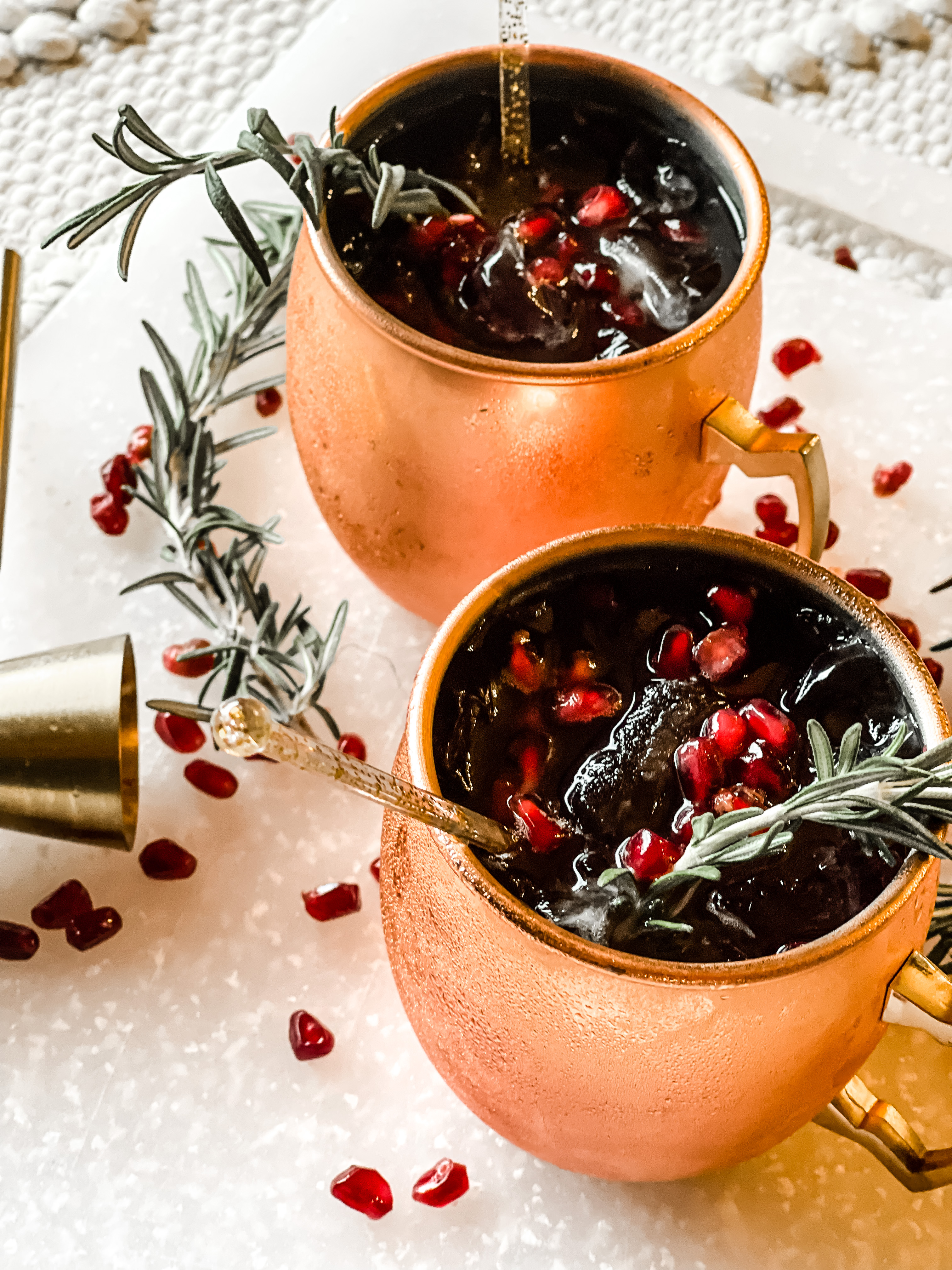 Pomegranate Moscow Mules - holiday happy hour idea - This is our Bliss #pomegranatemoscowmule #moscowmule #holidaycocktail